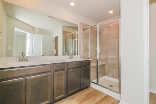 a bathroom with a large sink and a shower