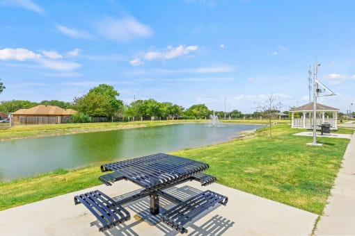 the preserve at ballantyne commons park benches next to a pond