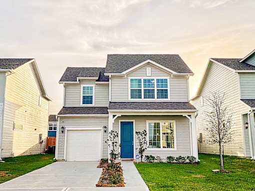 Landscaped Two-Story Home for Rent at Pradera Oaks in Rosharon, TX
