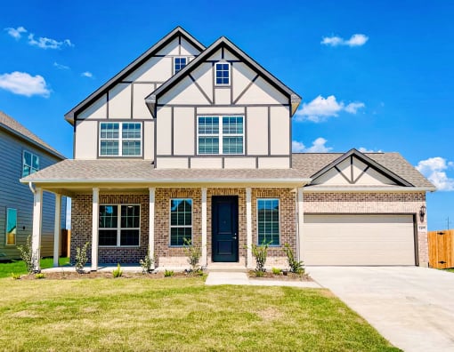 Building exterior view with pathway at The Residences at Rayzor Ranch, Texas, 76207