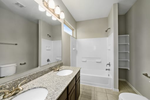 Bathroom With Vanity Lights at Bay Colony West, Texas