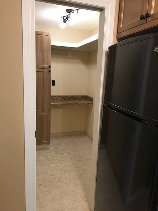 a view of the kitchen from the living room