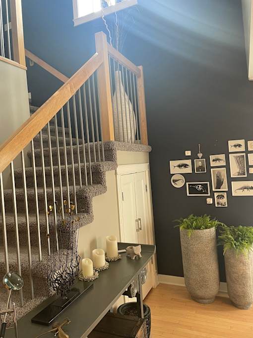 A staircase with a light shining on it.