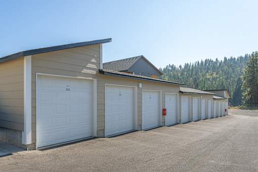 A row of garage doors are closed.