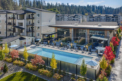 A large building with a pool in the middle of it.