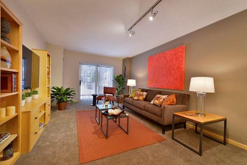 a living room with a couch and a table