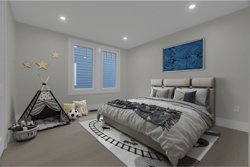 a bedroom with a bed and a toy teepee