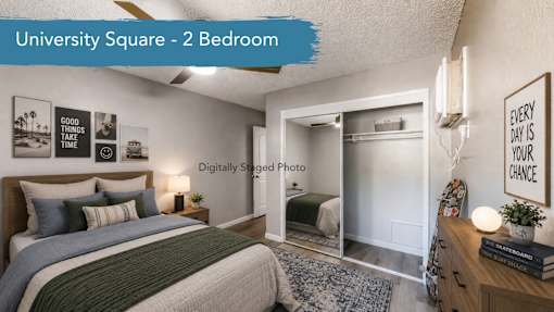 A bedroom with a bed, a dresser, and a framed picture on the wall.