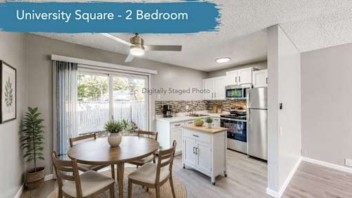 A kitchen with a table and chairs in a room with a ceiling fan.