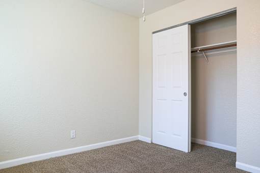 Bedroom With Closet at Creekview Homes, Chico