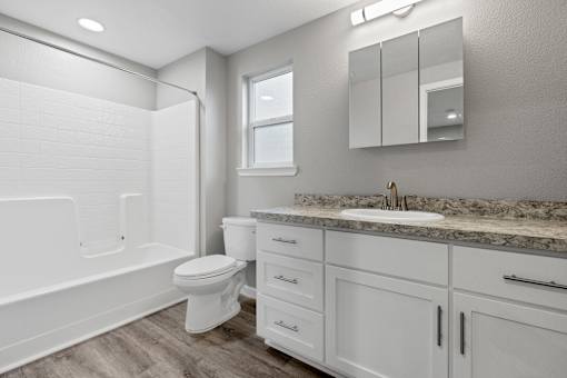 Bathroom With Bathtub at OSM Properties Homes & Apartments, Chico  