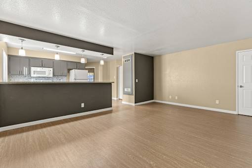 A kitchen area with a countertop and cabinets.at Redwood Cove Apartments, Chico, 95928  