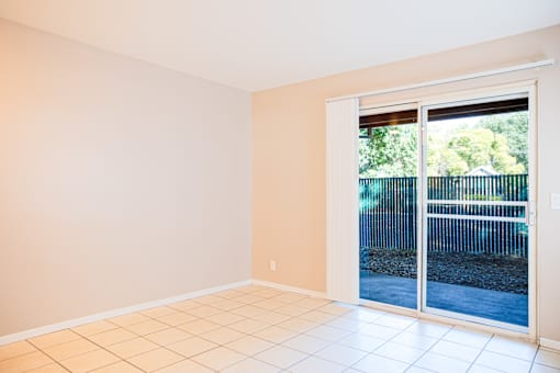 Living Area With Balcony at Pomona Townhomes, Chico, CA