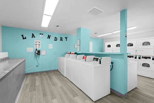 A laundry room with a washer and dryer.