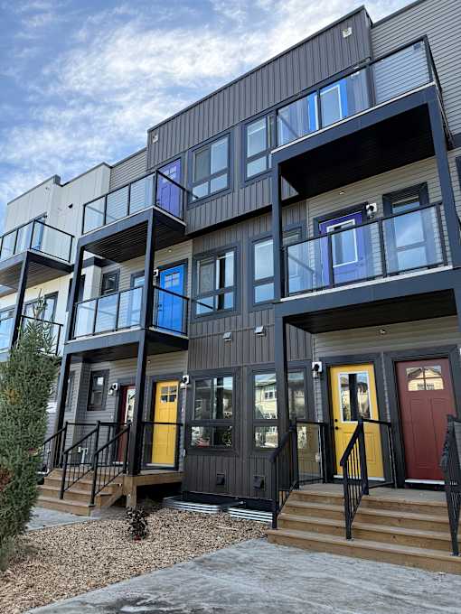 A modern building with balconies at The Pointe at Riverview, Edmonton, AB
