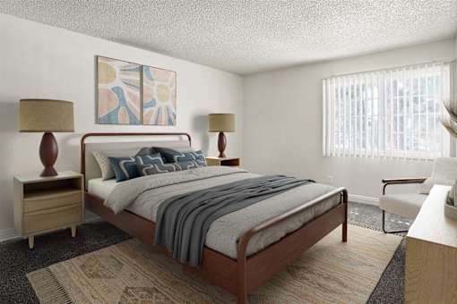 A bedroom with a bed, two lamps, and a painting on the wall.