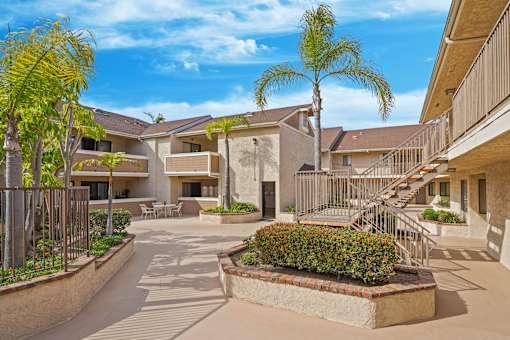 A sunny day at the courtyard of a residential building.