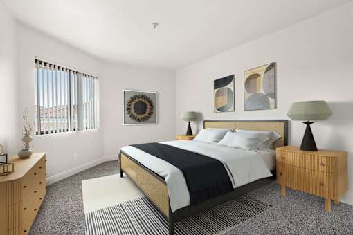 A bedroom with a bed, nightstand, and a dresser.