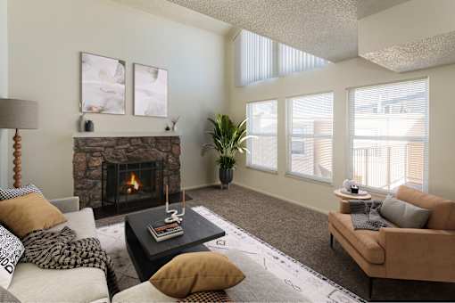 A living room with a fireplace and a couch.