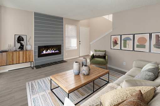 A living room with a fireplace and a couch.