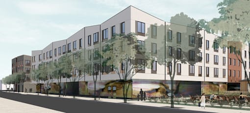 A modern building with a mural on the side is depicted in the image.