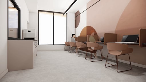 A room with a row of chairs and a person standing.