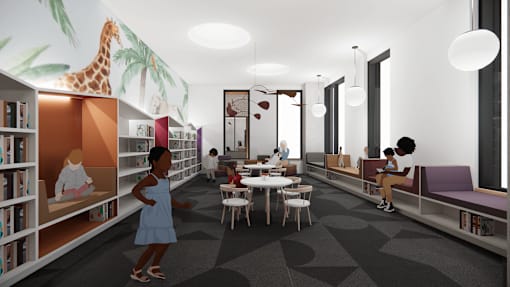 A library with children reading and a giraffe mural on the wall.