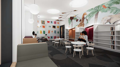 A room with a mural of a giraffe and a tree on the wall.