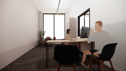 A man is sitting at a table with a laptop and a plant in the room.