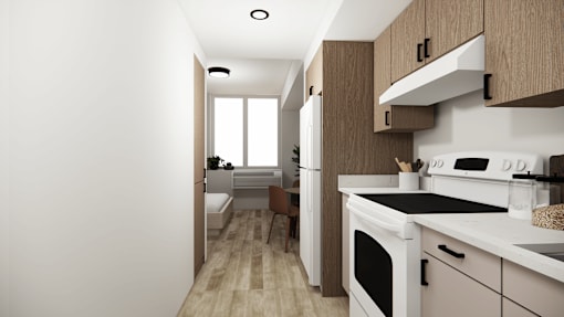 A modern kitchen with wooden cabinets and white appliances.