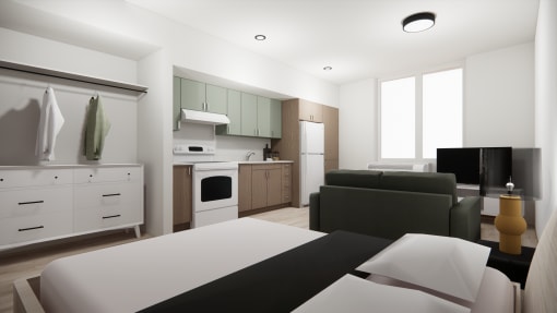 a room with a bed and a kitchen and a living room