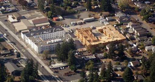 A construction site is in the middle of a residential area.