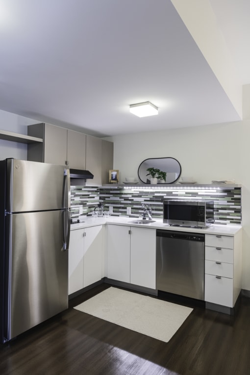 full size fridge kitchen area dishwasher