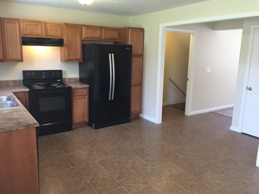 Modern Kitchen With modern Appliances And Double Door Refrigerators at Evergreen, Ohio