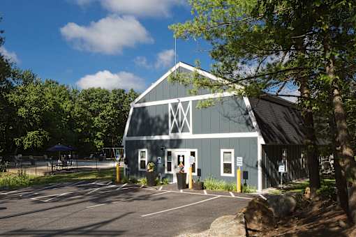 A blue building with a white M on the front.