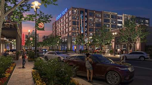 A woman is walking on a sidewalk next to a parked car at Anthem House Apartment, Huntsville, AL, 35806