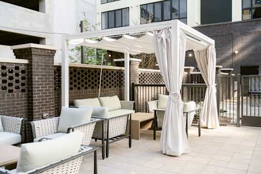 Patio with white furniture at Anthem House, Huntsville, Alabama