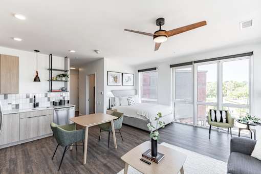 A modern living room with a dining table and chairs at Anthem House Apartment , Alabama, 35806