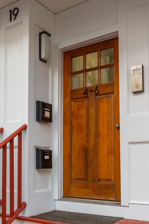 a wooden door with the number 49 on it
