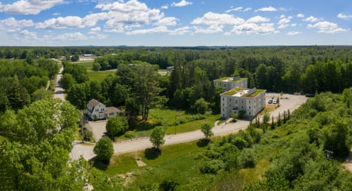 arial view of the building with the green roof