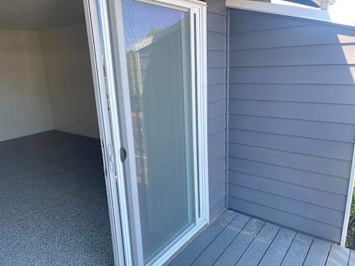 A sliding glass door on a house.