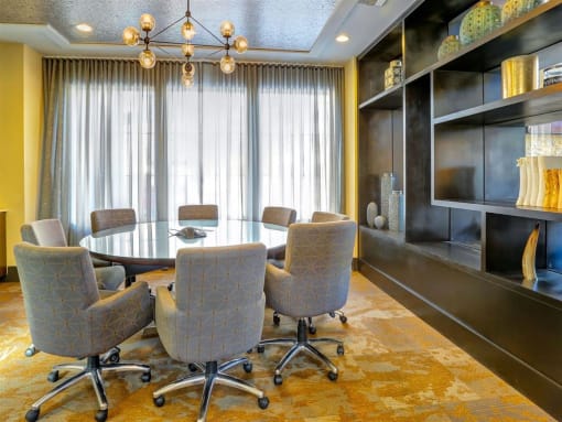 a conference room with a large table and chairs
