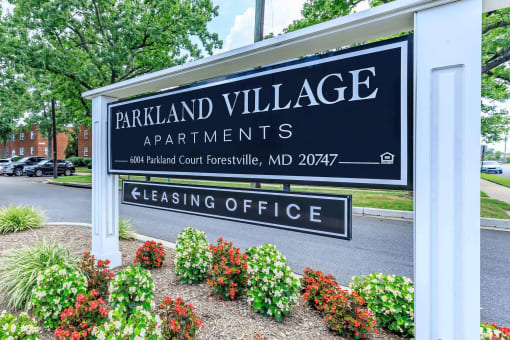 a sign for the parkland village apartments at Parkland Village, Forestville, MD 20747