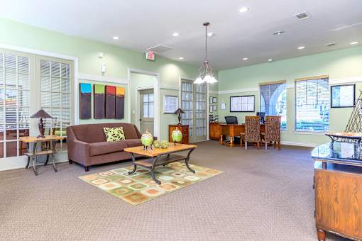 a living room with a couch and a table