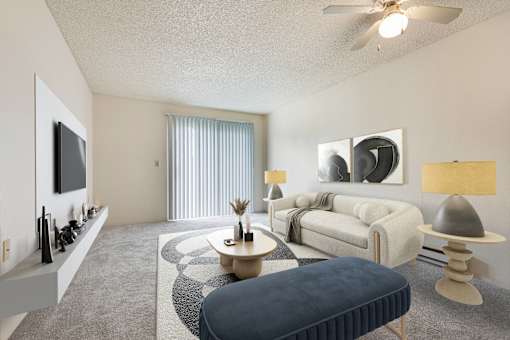 a living room with a couch and a coffee table at Eagles Landing Apartments, Everett, WA
