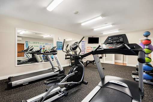 exercise equipment in the gym at meridian pointe apartments at Sage Apartments, Everett, 98204