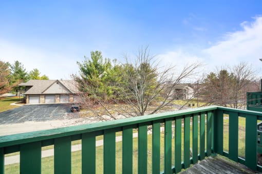 the deck has a view of the neighborhood