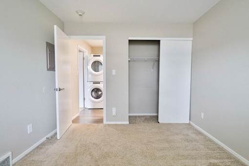 A laundry room with a washer and dryer.