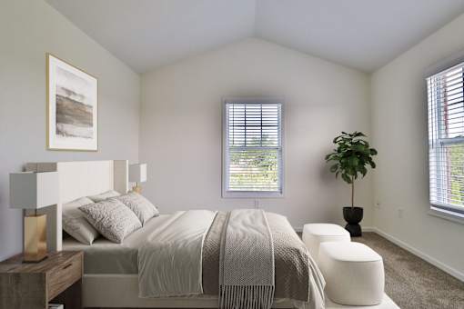 A bedroom with a bed, a potted plant, and a window.
