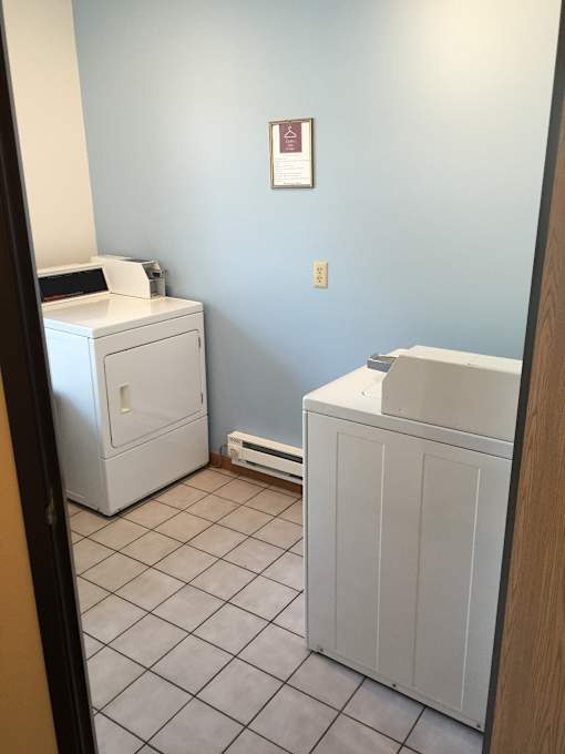 A bathroom with a toilet and a sink.